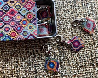 Janie Crow Mystical Lanterns, Crochet Stitch Markers in a tin (set of 6), Produced by Emma Ball. Height 15mm, Width 60mm, Depth 40mm.