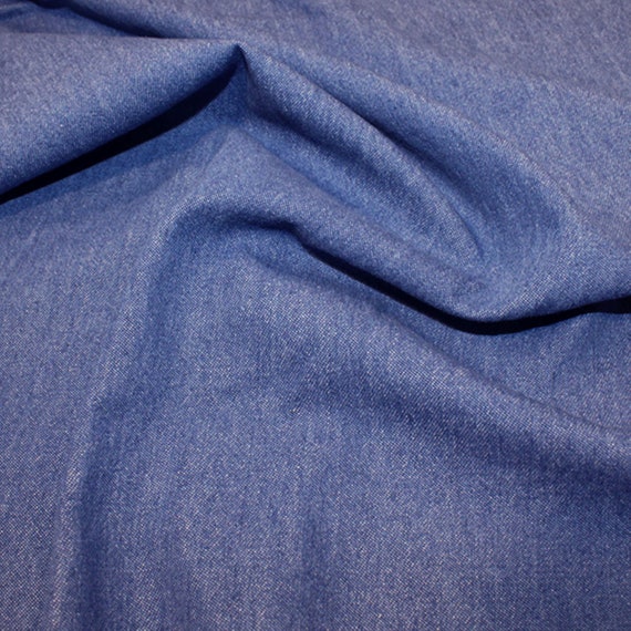 8oz Washed Denim Fabric 'Shade Medium - Denim Blue'.  58in (145cm) Wide. 100% Cotton. Weight 287 gsm. For clothing, craft and furnishings.