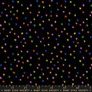 May include: Black fabric featuring a random pattern of multi-coloured stars. The stars are in shades of pink, yellow, green, orange, and blue. The text "RUBY STAR SOCIETY" is printed at the bottom of the image.