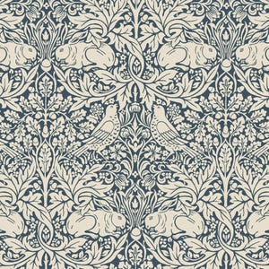 May include: A symmetrical pattern with rabbits, birds, and leaves in a two-tone colour scheme. The design uses cream and navy blue, creating a classic and elegant aesthetic. The pattern is suitable for fabric or wallpaper, with a traditional feel.