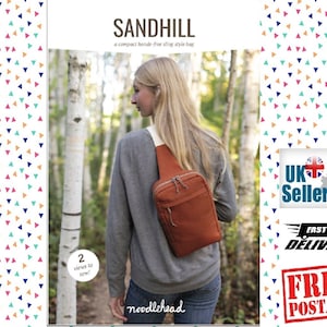 May include: A sewing pattern for a brown sling bag called "Sandhill". The pattern includes two views to sew. The pattern is from Noodlehead.