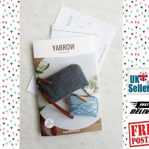 May include: A sewing pattern for a Yarrow wallet and pouch. The pattern includes two steps to sew. The pattern is by Noodlehead.