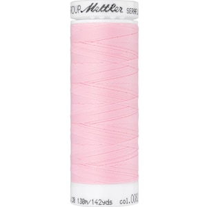 May include: A spool of pink thread with the text "pour Gütermann Serfilan 120 130m/142yds col.0000" on the label.