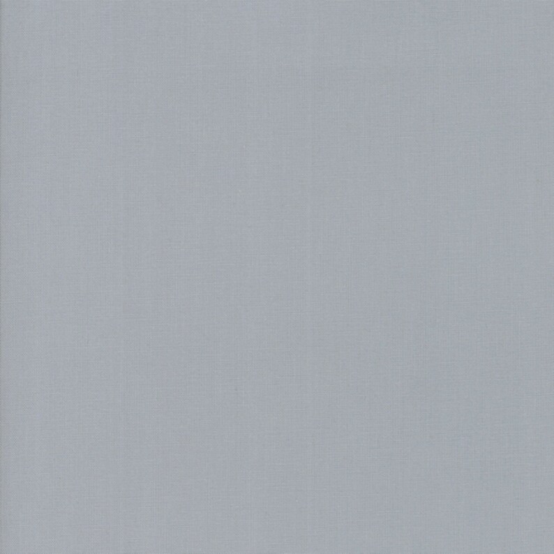 May include: A plain, light gray fabric with a subtle woven texture.