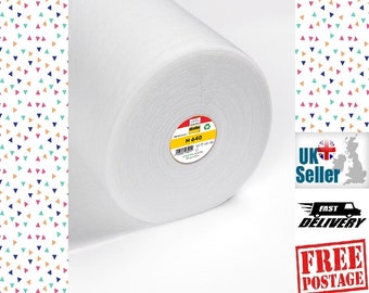 May include: A white roll of fusible interfacing fabric with a label that says "H 640".