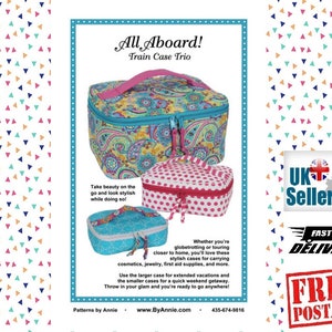 May include: A set of three colorful train cases with paisley, polka dot, and geometric patterns. The cases are labeled "All Aboard! Train Case Trio".