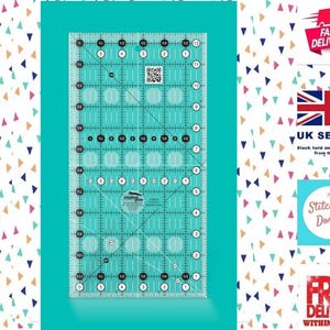 May include: A turquoise blue 15cm by 30cm quilting ruler with a diagonal line and grid markings. The ruler is made of clear plastic and has a circular logo in the center.