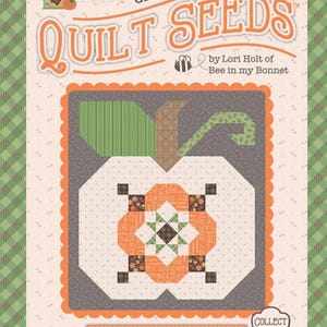 May include: A quilt pattern design featuring a pumpkin with the text "QUILT SEEDS" and "PUMPKIN NO. 3". The design includes a pumpkin shape with a green stem and leaf, and an orange and brown center. The background is a light beige with a green and white checkered pattern.
