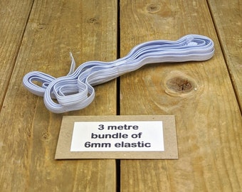White Elastic 6mm / 16 cord wide knicker elastic sold in length of 3 metres.  Suitable for face masks and general sewing