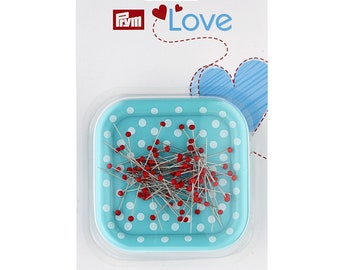 Prym Love, Magnetic Pin Cushion with Glass Headed Pins. A handy square pincushion in the 'Love' range mint colour, 8.5cm square