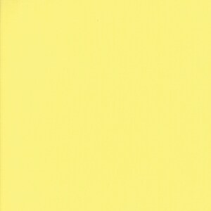 May include: A solid yellow background.