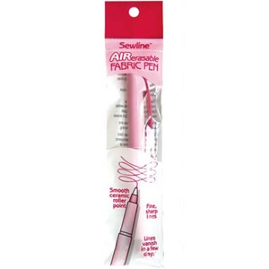 Könnte beinhalten: Ein rosa Sewline Air Erasable Fabric Pen mit einer glatten Keramik-Rollenspitze. Der Stift ist in einer durchsichtigen Plastiktüte verpackt, auf der der Markenname und die Produktbeschreibung aufgedruckt sind.