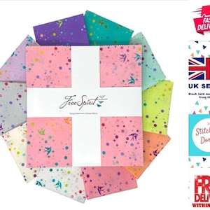 May include: A collection of colorful fabric squares arranged in a circular pattern. The squares feature various patterns, including stars, dots, and bird silhouettes, in shades of pink, purple, green, and yellow. The center displays the "Free Spirit" logo.