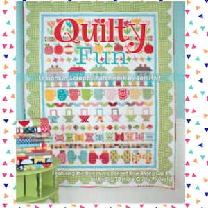 Puede incluir: Un edredón colorido con las palabras "Quilty Fun" en rojo y verde. El edredón presenta varios diseños de patchwork, incluyendo manzanas, tazas de té y mitones. Una pila de tela descansa sobre una mesa verde frente al edredón. El texto "Lessons in Scrappy Patchwork by Lori Holt" también es visible.