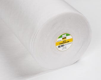 May include: A white roll of 372 Therm-O-Lam interfacing fabric. The label is yellow with black text and a green border.