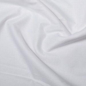 May include: White cotton fabric with a smooth, even texture. The fabric is slightly wrinkled and has a soft, drapey feel.