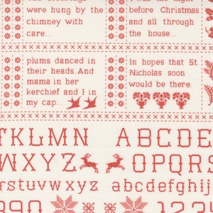 May include: A white fabric with red embroidered text and images. The text includes a Christmas carol about stockings being hung by the chimney. The fabric also includes a full alphabet in uppercase and lowercase letters, as well as numbers 0-9.