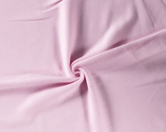 Forro polar 100% algodón orgánico en un precioso color rosa bebé, 320 g/m², varios largos de 1,5 m.