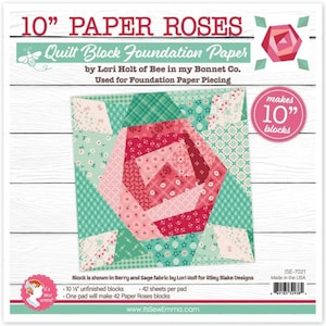 May include: A package of 10" Paper Roses Quilt Block Foundation Paper by Lori Holt. The package features a quilt block design with a large red and pink rose in the center, surrounded by green and white patterned fabric. The paper is used for foundation paper piecing.