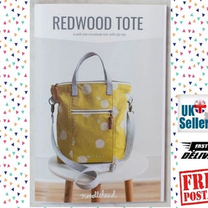 May include: A sewing pattern for a yellow and white polka dot tote bag with a zip top and a crossbody strap. The pattern is called "Redwood Tote" and is by Noodlehead.