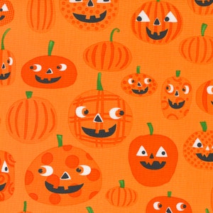 May include: Orange background with a repeating pattern of orange pumpkins with different facial expressions. Some pumpkins have polka dots, stripes, or a checkered pattern.