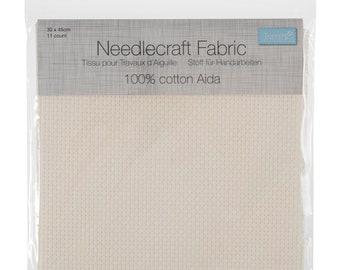 May include: A white 11 count Aida fabric for needlepoint, cross stitch, or embroidery projects. The fabric is 30 inches by 45 inches. The packaging says "Needlecraft Fabric" and "100% cotton Aida".