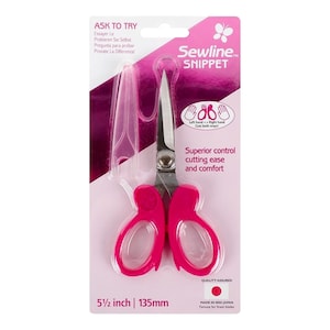 May include: Pink handled scissors with a silver blade. The scissors are 5 1/2 inches long and are labeled "Sewline Snippet". The packaging also says "Quality Assured" and "Made in Seki Japan, Famous for finest blades".