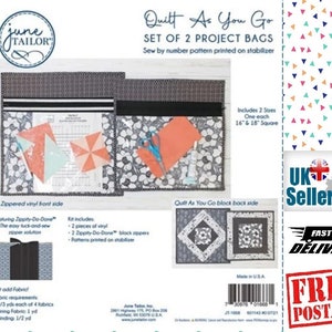 May include: A set of two quilt project bags with zippered vinyl front sides and black fabric backs. The bags are labelled "Quilt As You Go" and feature a black and white floral pattern. The bags are designed to hold quilt blocks and other quilting supplies. The text "Sew by number pattern printed on stabilizer" is printed on the front of the bags.