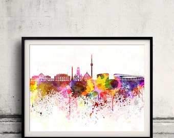 May include: A watercolor painting of the Berlin skyline, featuring iconic buildings like the Brandenburg Gate and the Reichstag. The painting is done in a vibrant palette of colors, with splashes of pink, yellow, blue, and green.