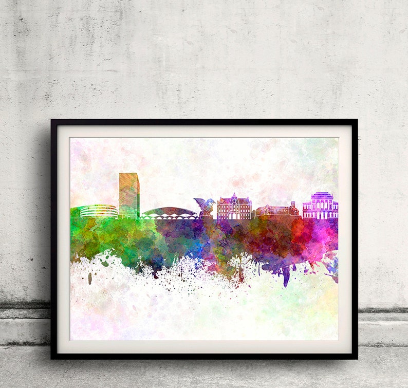 May include: A watercolor painting of a city skyline with a tall building, a bridge, and several other buildings. The painting is done in shades of blue, green, purple, and pink, with a white background.