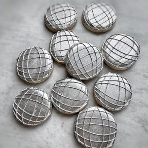One dozen disco ball cookies