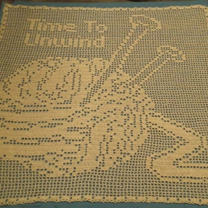 May include: A beige crocheted doily with a floral design. The doily is square and has a delicate, intricate pattern.