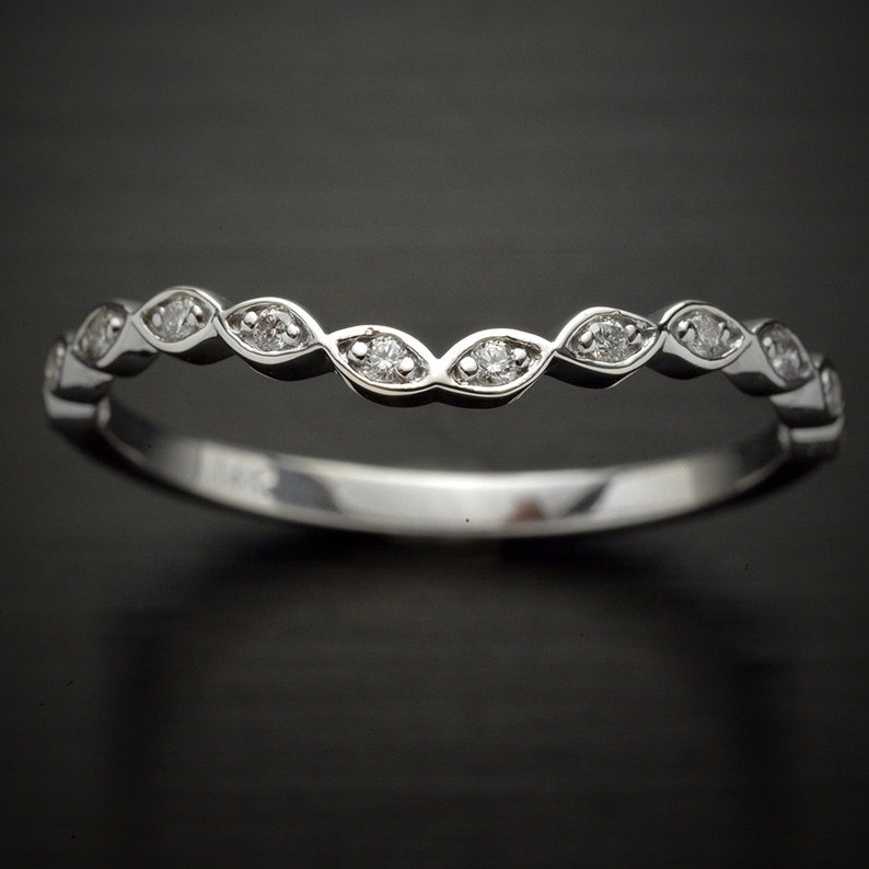 Curved Wedding band in Platinum or 14kt white gold and 12