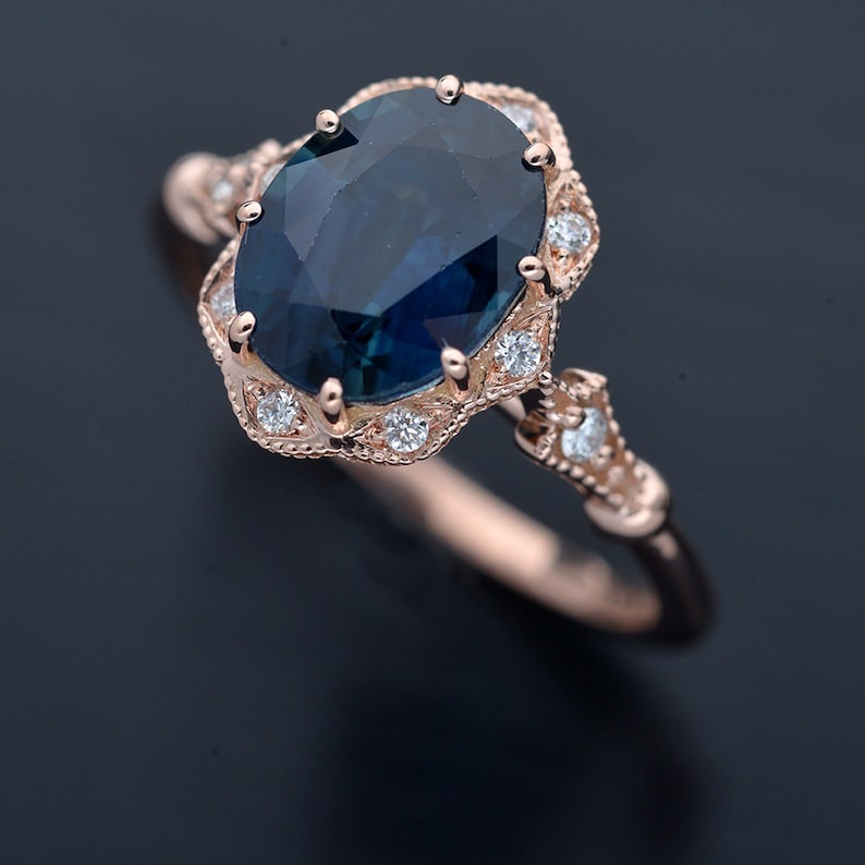 Halo engagement ring with a natural deep blue Australian Etsy
