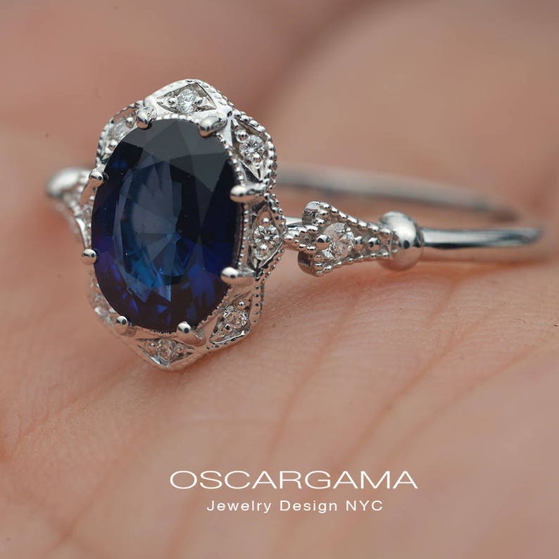 Halo engagement ring with a natural deep blue Australian Etsy