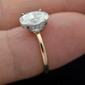 Two tone Solitaire Engagement ring 9x7, or 8X6 DEF VVS Moissanite 14kt white, pink Gold With diamond accents on the head image 4