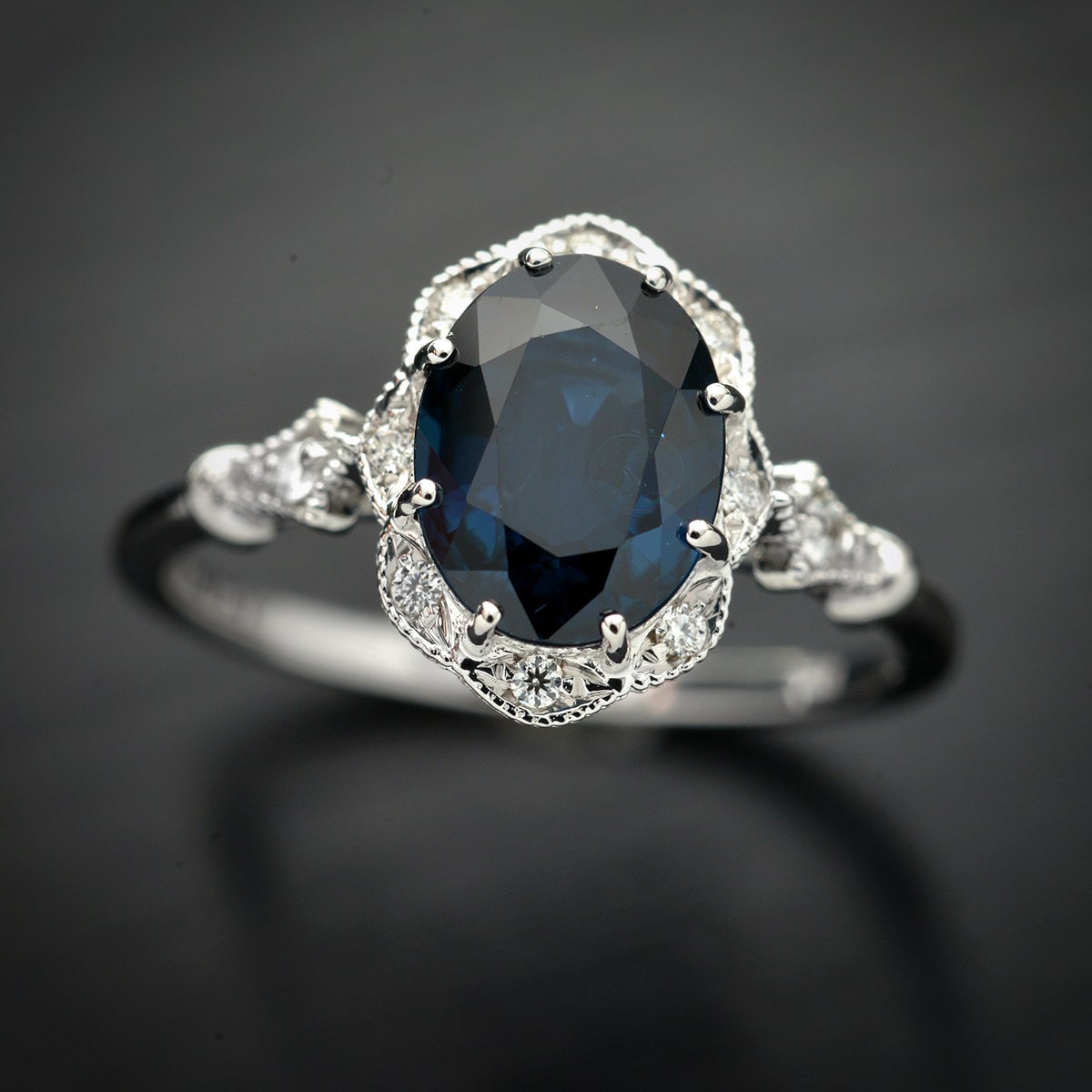 Halo engagement ring with a natural deep blue Australian Etsy