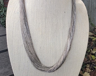 Vintage Carolyn Pollack 100-strand liquid silver necklace.