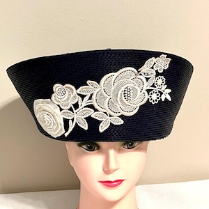 Vintage navy blue straw women hat with high trim and white lace flowers