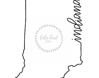 May include: A black line drawing of the state of Indiana with the text "lola bird letters" in a grey wreath inside the state outline.
