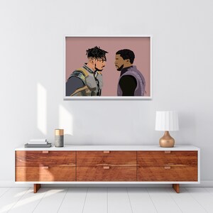 May include: A framed illustration of two men facing each other. The man on the left is wearing a black and gold suit. The man on the right is wearing a black suit with a purple scarf. The background is a light pink color.