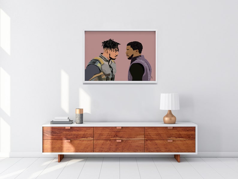 May include: A framed illustration of two men facing each other. The man on the left is wearing a black and gold suit. The man on the right is wearing a black suit with a purple scarf. The background is a light pink color.