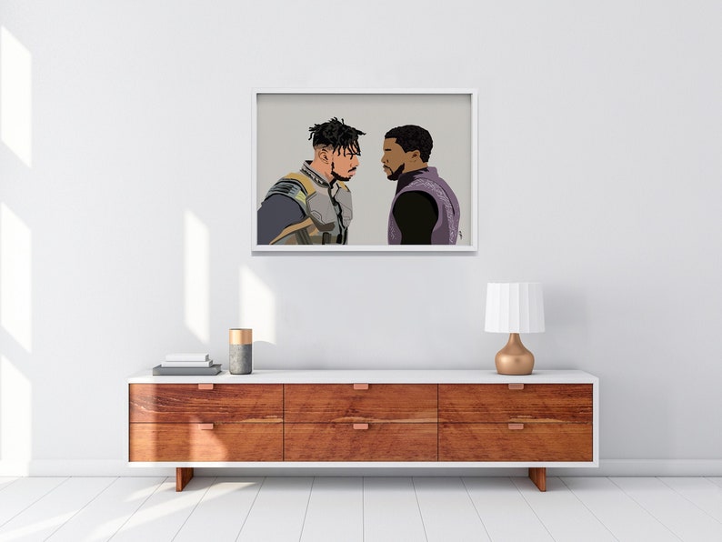 May include: A framed illustration of two men facing each other. The man on the left is wearing a black and yellow costume. The man on the right is wearing a black and purple costume. The background is a light gray.