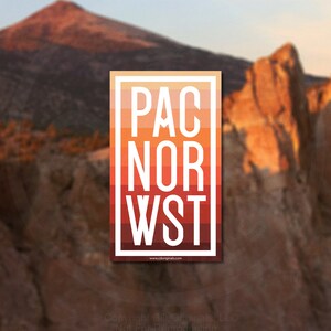 May include: A sticker with a gradient background of orange, red, and brown. The sticker has white text that reads "PAC NOR WST" and a website address at the bottom.