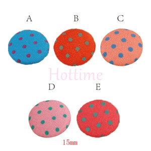 May include: Five fabric buttons with polka dot patterns in various colours. The buttons are blue, orange, coral, pink, and red, each with contrasting dots. The text "Hottime" is in the center, and the size is 1.5cm.
