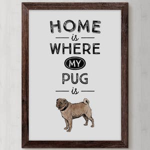 May include: A framed print with the text "Home is where my pug is" in black lettering on a white background. A brown pug is illustrated below the text.