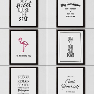 May include: Ten black framed bathroom signs with white text. The signs feature humorous bathroom-related sayings, such as "Wash Your Worries Away", "Be a Sweet Close the Seat", and "Just Put That Seat Down".