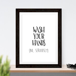 May include: Black and white framed print with the text "Wash your hands (No, seriously)"