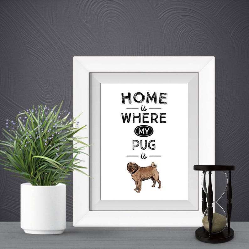 May include: White framed print with black text that reads "Home is where my pug is". A brown pug is illustrated below the text.