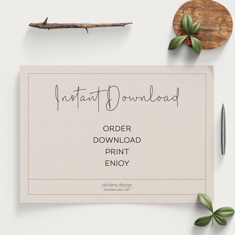 An instant download guide print displayed on a white surface with green leaves and a wooden tray.